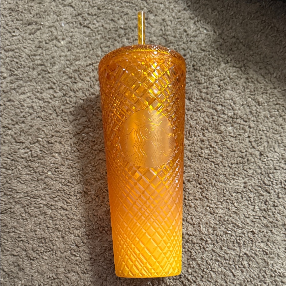 Starbucks Orange Candle with Textured Design